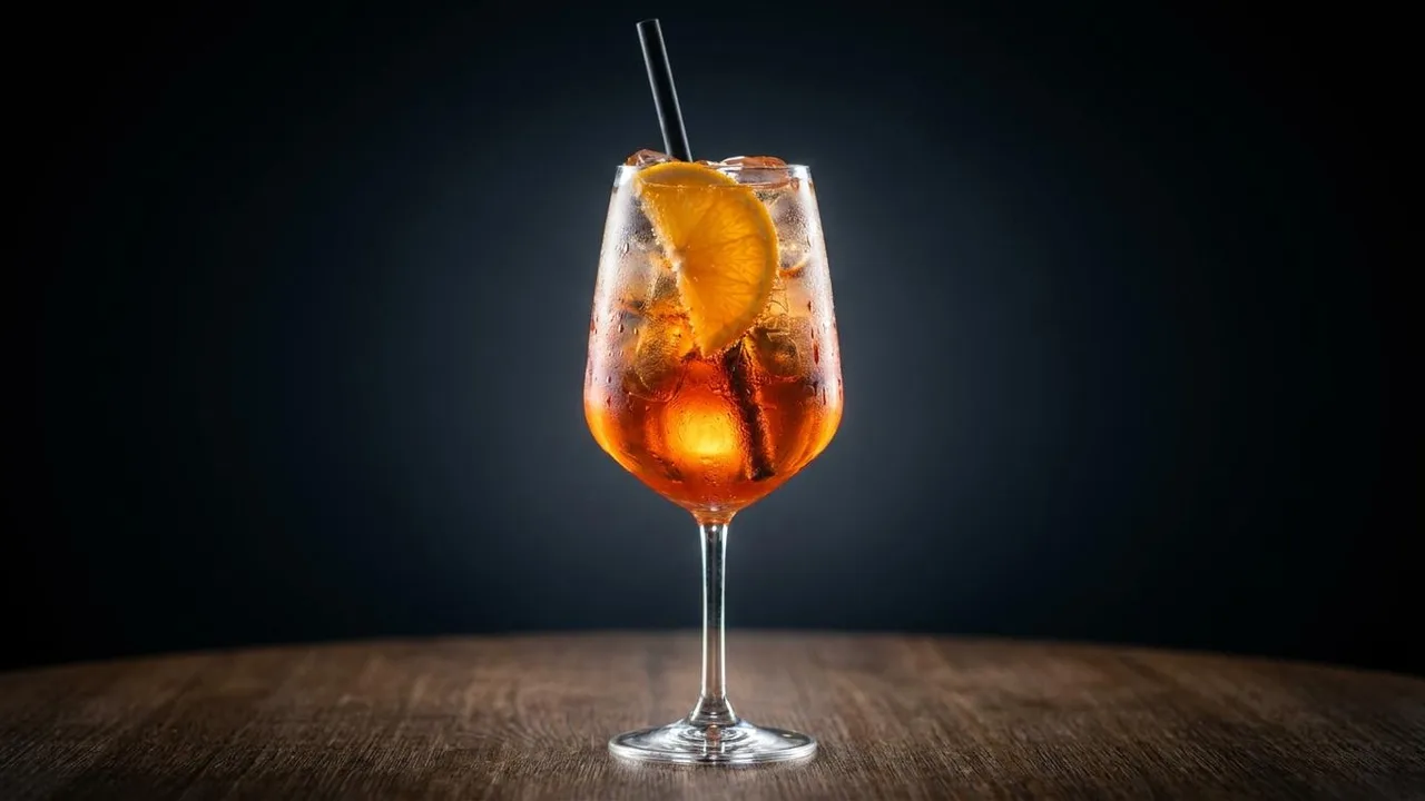 Studio-lit beverage glamour shot of the same spritz